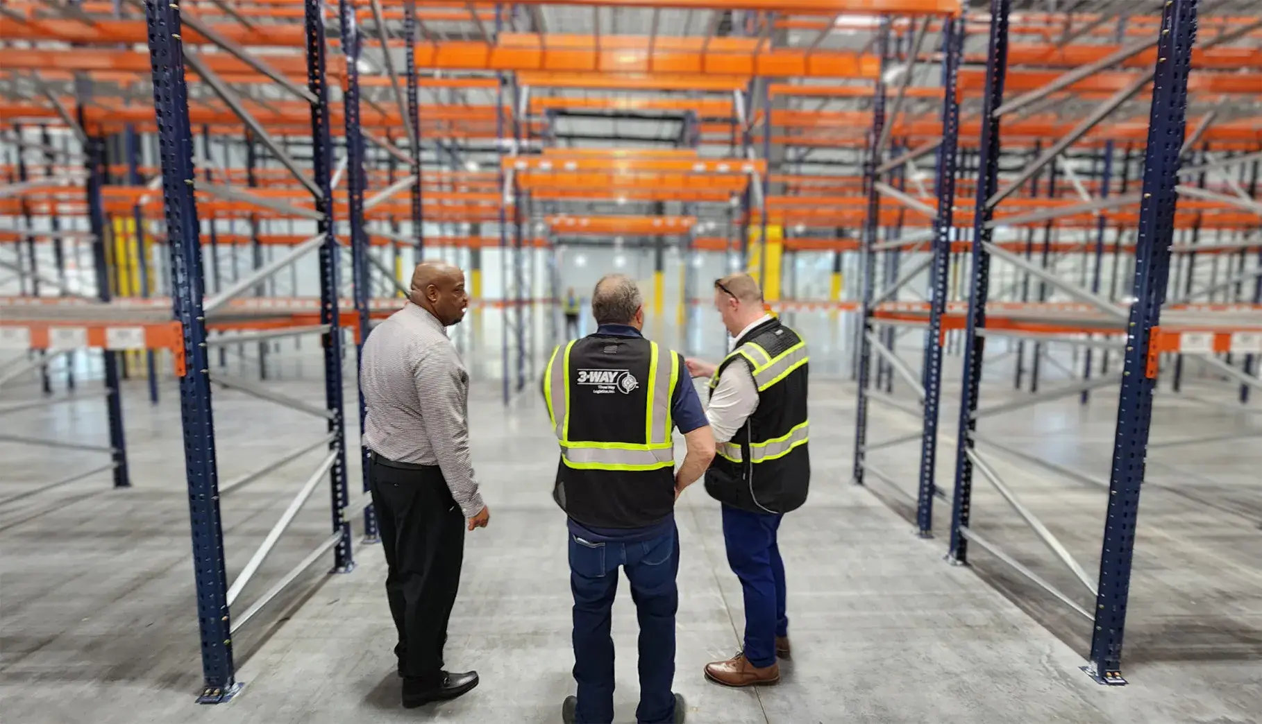 Employees-in-warehouse Three Way Logistics employees in a warehouse